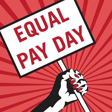 Equal Pay Day with hand holding up sign