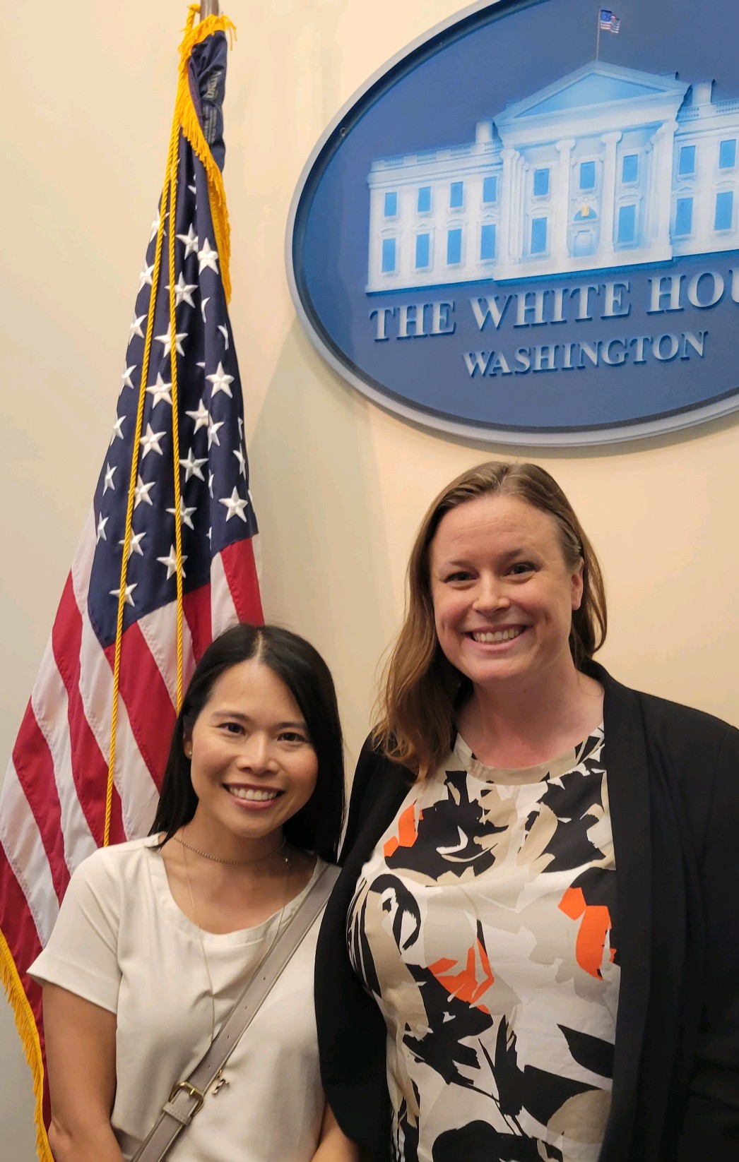 To-Wen Tseng and Senior Staff Attorney Julia Parish celebrating PWFA and PUMP for Nursing Mothers Act at the White House